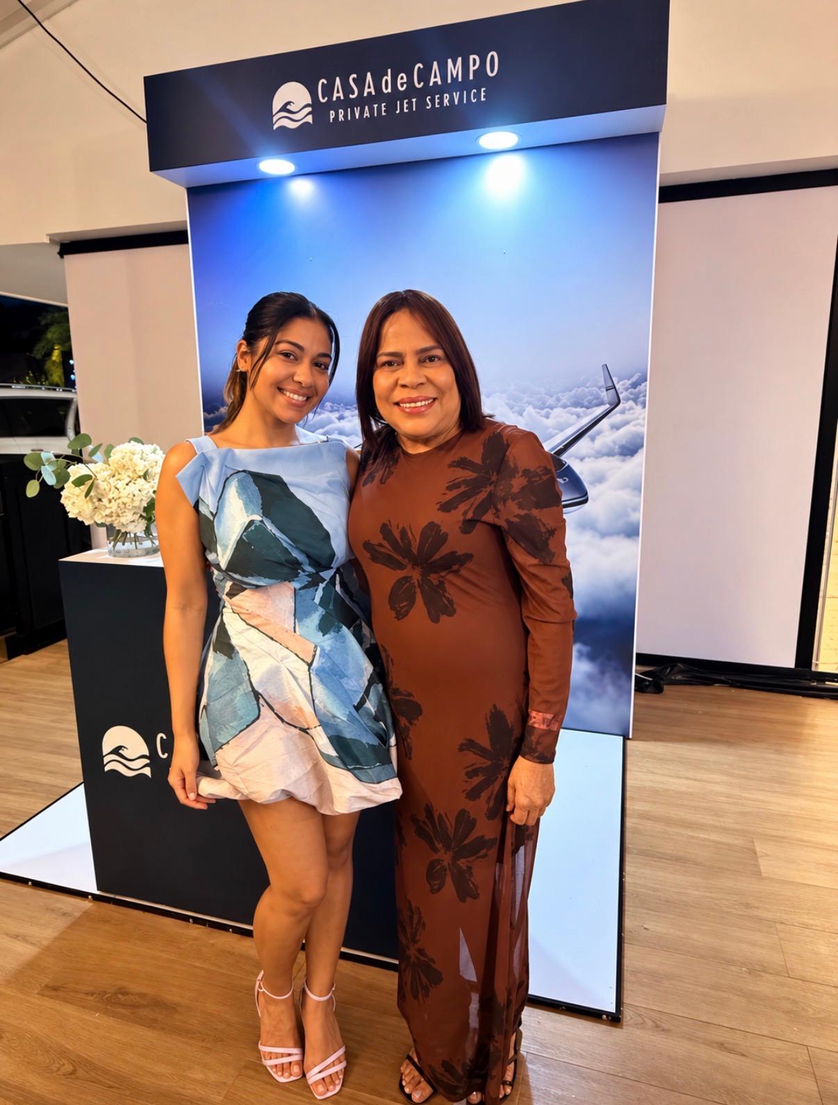 Vanesa Cueto with Rosario Velez, Director of Human Resources, at the Casa de Campo Private Jet Service booth